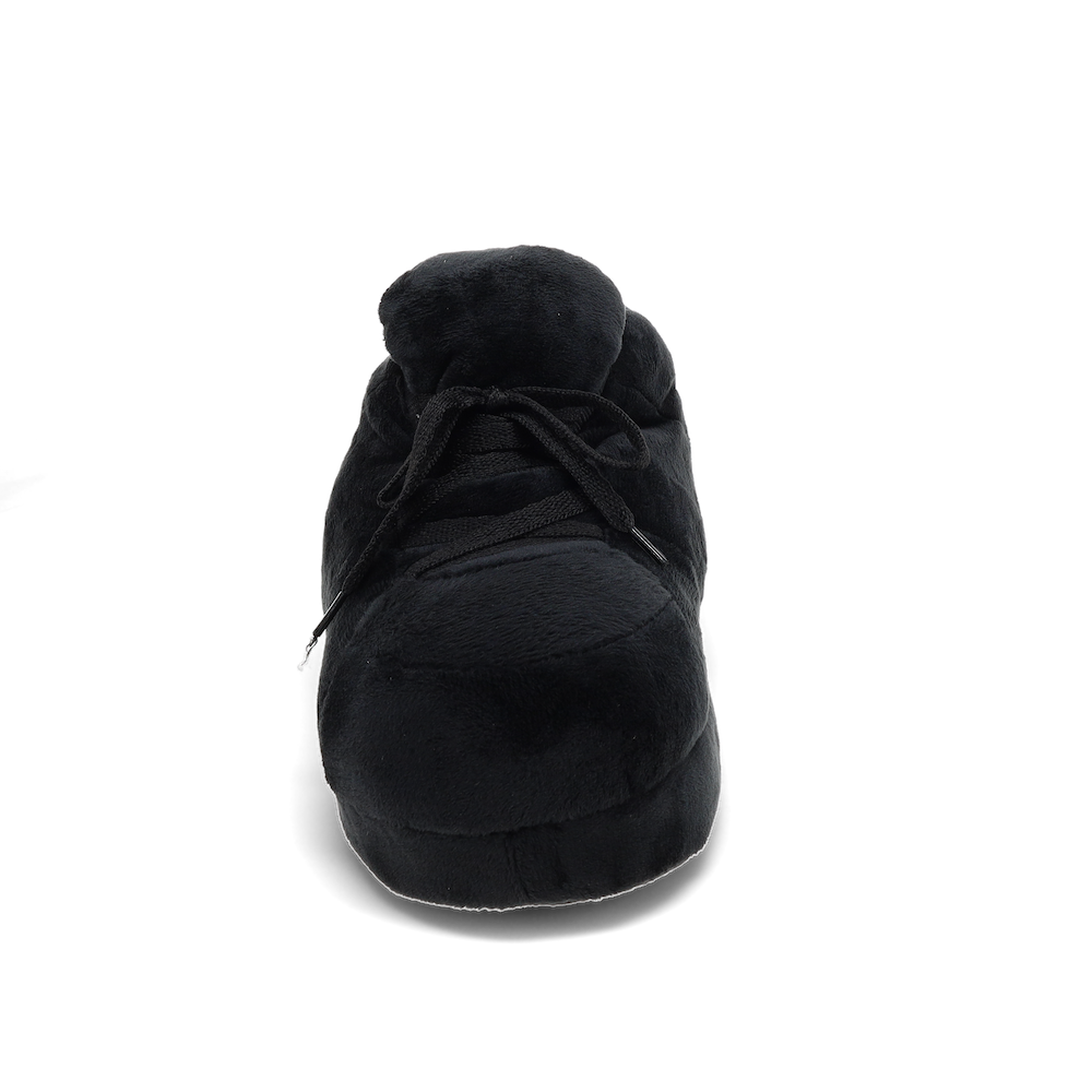 Solid black plush slippers with a non-slip sole for indoor wear